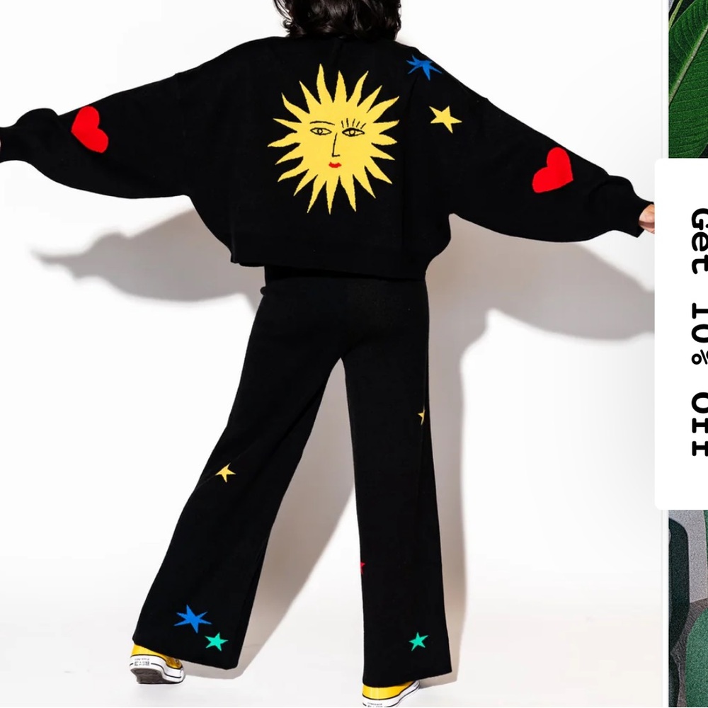 Dressed in Lala Celestial knit pants only